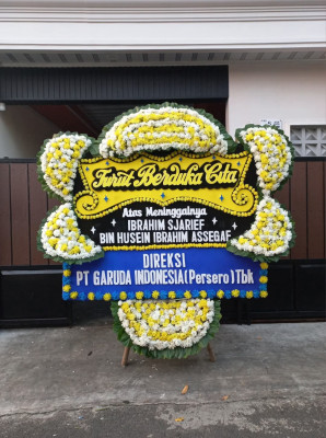 Papan Bunga Duka di Obi